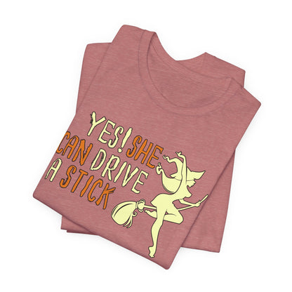 "Yes! She Can Drive A Stick" Tee | Hilarious Halloween Themed Graphic T-Shirt