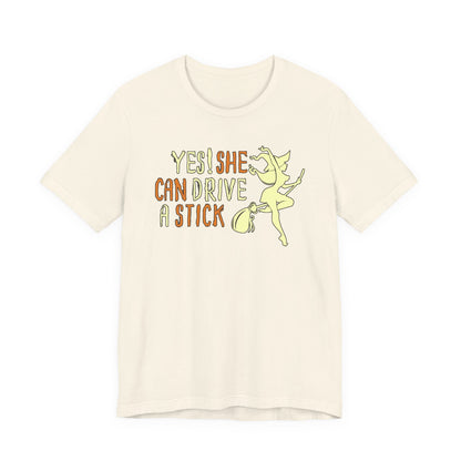 "Yes! She Can Drive A Stick" Tee | Hilarious Halloween Themed Graphic T-Shirt