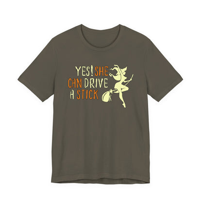 "Yes! She Can Drive A Stick" Tee | Hilarious Halloween Themed Graphic T-Shirt