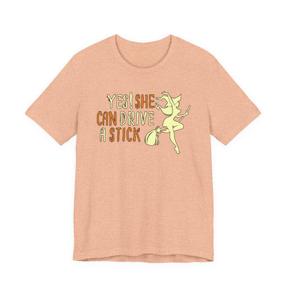"Yes! She Can Drive A Stick" Tee | Hilarious Halloween Themed Graphic T-Shirt